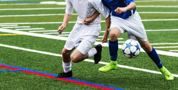 Two soccer players fight for the ball — Stock Photo, Image