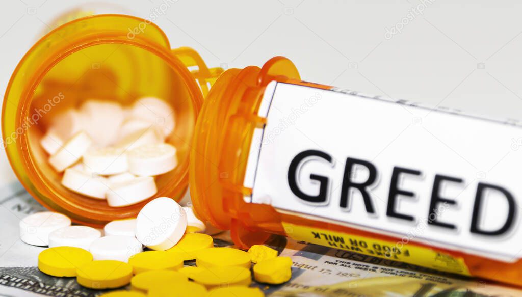 Greed is written on one of two pill bottles that have medicine spilling out on to US currency.