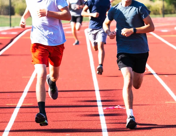 Vista Frontale Una Squadra Liceali Che Corre Due Due Corsie — Foto Stock