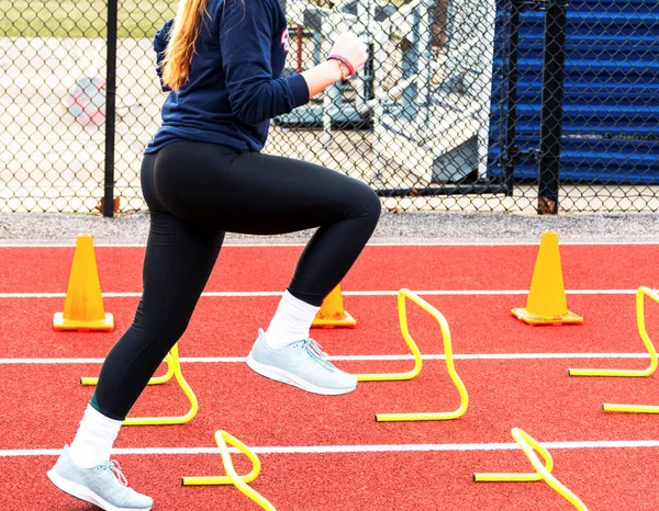 Side View High School Girl Stepping Yellow Mini Hurdles Speed — Stock Photo, Image