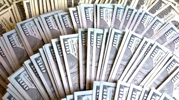 US dollars background. A lot of one hundred new and old usd banknotes. Close up view of american cash money — Stock Photo, Image