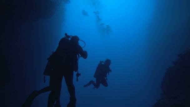 Divers and Cave — Stock Video