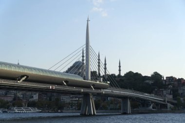 The Metro Subway on The Golden Horn is destroying the cityscape. Suleymaniye Mosque and subway station is visible too with cityscape.