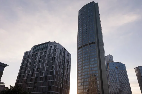 Istanbul, Turkey - March 1, 2020 : Skyscrapers and office buildings on a finance area at Bomonti, Istanbul in sunset time as silhouettes.