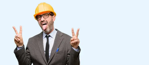 Senior Architect Engineer Looking Camera Showing Tong Making Victory Sign — Stock Photo, Image