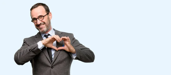 Maestro Hombre Usando Gafas Feliz Mostrando Amor Con Las Manos —  Fotos de Stock