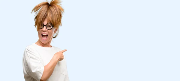 Crazy Middle Age Woman Wearing Silly Glasses Pointing Away Side — Stock Photo, Image