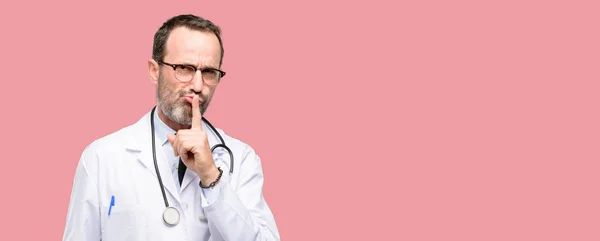 Doctor Senior Man Medical Professional Index Finger Lips Ask Quiet — Stock Photo, Image