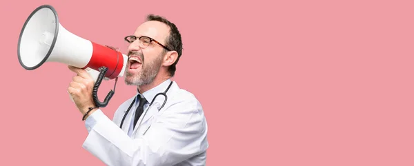 Doctor Senior Man Medical Professional Communicates Shouting Loud Holding Megaphone — Stock Photo, Image