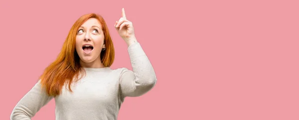 Beautiful Young Redhead Woman Happy Surprised Cheering Expressing Wow Gesture — Stock Photo, Image