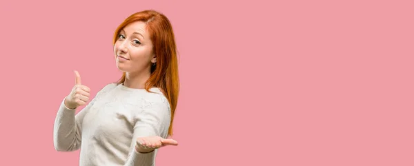 Beautiful Young Redhead Woman Thumb Holding Something Empty Hand Making — Stock Photo, Image