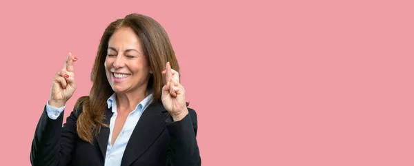 Middle Age Business Woman Crossed Fingers Asking Good Luck — Stock Photo, Image