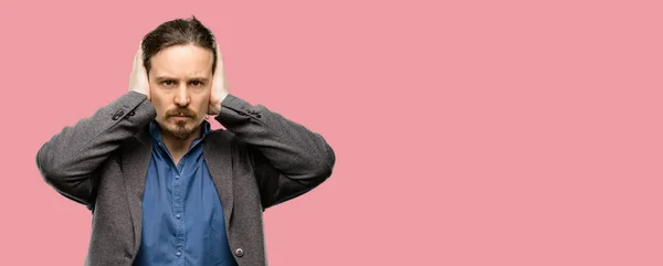 Handsome Young Man Covering Ears Ignoring Annoying Loud Noise Plugs — Stock Photo, Image