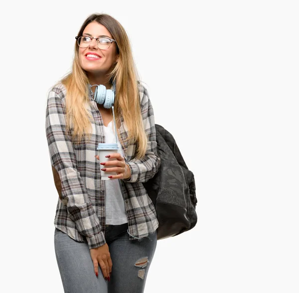 Mujer Estudiante Joven Con Auriculares Mochila Pensando Mirando Hacia Arriba —  Fotos de Stock