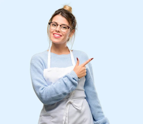 Young Woman Shop Owner Wearing Apron Pointing Away Side Finger — Stock Photo, Image