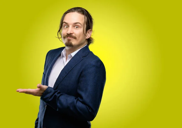 Handsome Young Man Holding Something His Empty Hand — Stock Photo, Image