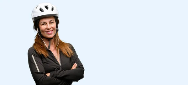 Middle Age Cyclist Woman Using Earphones Crossed Arms Confident Happy — Stock Photo, Image