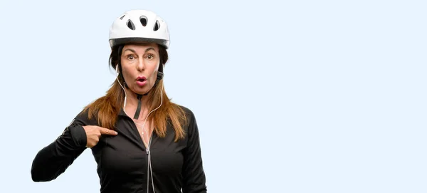 Middle Age Cyclist Woman Using Earphones Happy Surprised Cheering Expressing — Stock Photo, Image