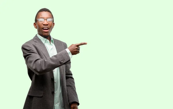 African Black Man Wearing Jacket Pointing Away Side Finger — Stock Photo, Image