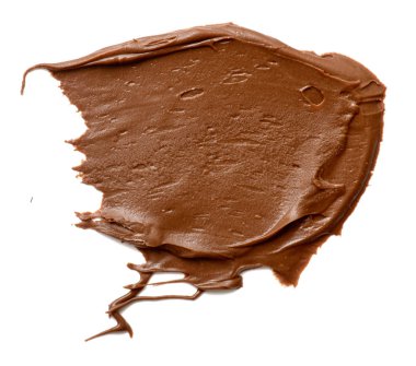 Krem çikolata üzerinde beyaz artalanları izole yayılıyor. Gıda ba