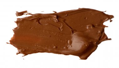 Beyaz arka plan üzerinde izole çikolata yayıldı. Lezzetli yemekler 