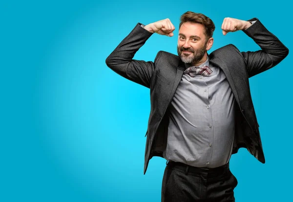 Middle Age Man Beard Bow Tie Showing Biceps Expressing Strength Stock Photo