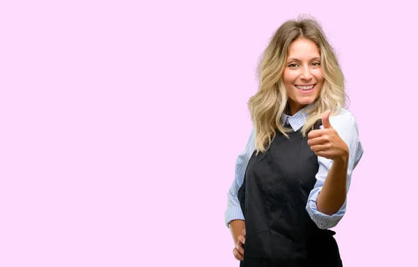 Young Shop Owner Wearing Black Apron Smiling Broadly Showing Thumbs — Stock Photo, Image