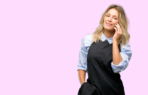 Young Shop Owner Wearing Black Apron Happy Talking Using Smartphone — Stock Photo, Image