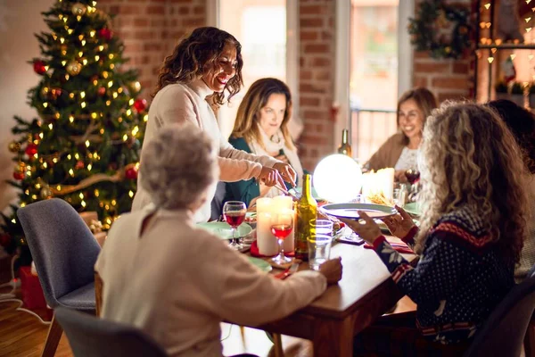 Beautiful Group Women Smiling Happy Confident Carving Roasted Turkey Celebrating — Stock Photo, Image