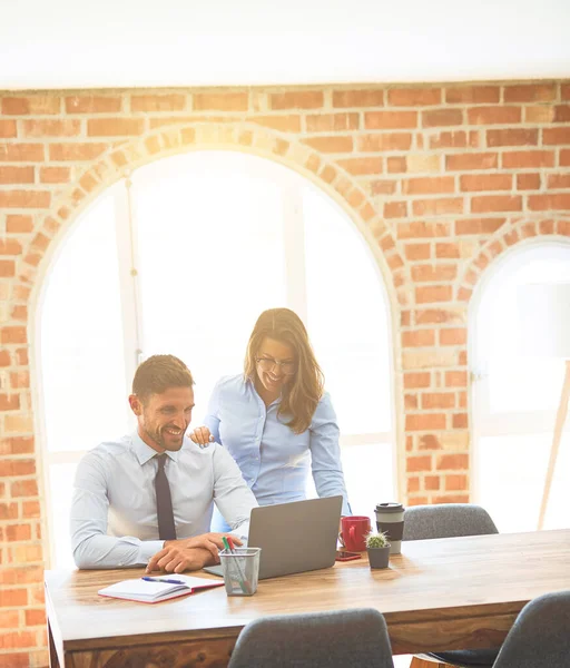 Young business team of woman and man working together at the office