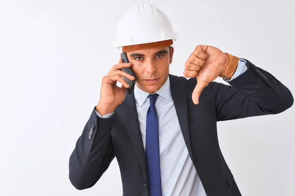 Young Architect Man Wearing Helmet Talking Smartphone Isolated White Background — Stock Photo, Image