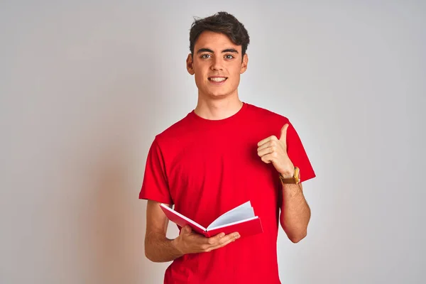 Adolescente Estudante Menino Lendo Livro Sobre Isolado Fundo Feliz Com — Fotografia de Stock