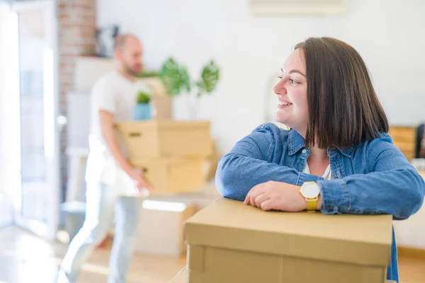 Young couple moving to new apartment