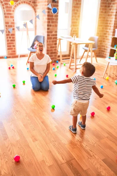 Beautiful Teacher Toddler Boy Playing Colored Small Balls Kindergarten — Stock Photo, Image