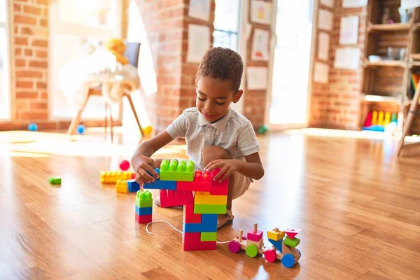 Beautiful African American Toddler Playing Building Blocks Smiling Kindergarten — Stock Photo, Image