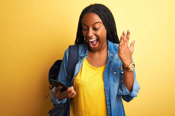 African American Student Woman Using Smartphone Standing Isolated Yellow Background — Stock Photo, Image