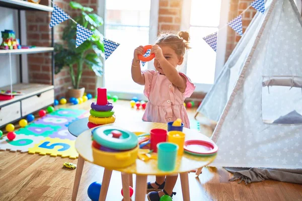 Young Beautiful Toddler Smiling Building Pyramid Using Hoops Table Kindergaten — Stock Photo, Image