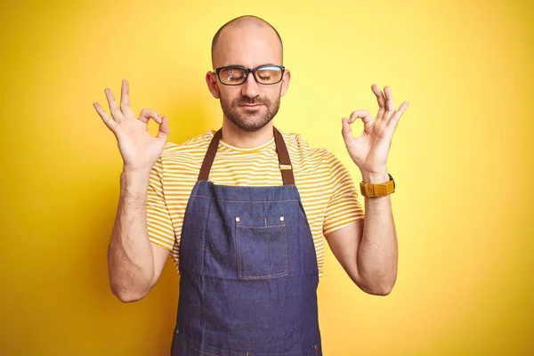Young Bartender Man Wearing Barista Apron Working Professional Yellow Background — Stock Photo, Image