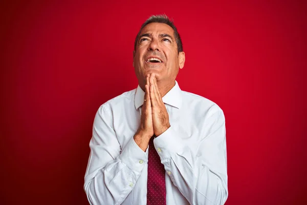 Handsome Middle Age Businessman Standing Isolated Red Background Begging Praying — Stock Photo, Image