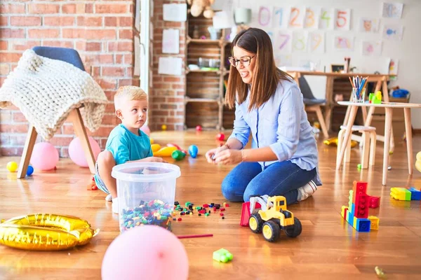 Young Caucasian Child Playing Playschool Teacher Mother Son Playroom Bulding — Stock Photo, Image