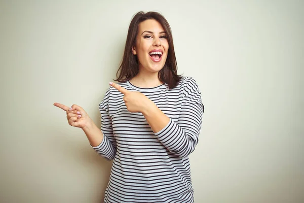 Young Beautiful Brunette Woman Wearing Striped Sweater White Isolated Background — Stock Photo, Image