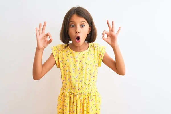 Young Beautiful Child Girl Wearing Yellow Floral Dress Standing Isolated — Stock fotografie