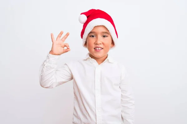 Beautiful Kid Boy Wearing Christmas Santa Hat Standing Isolated White — Stock Photo, Image