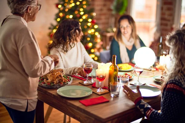 Beautiful Group Women Smiling Happy Confident Carving Roasted Turkey Celebrating — Stock Photo, Image