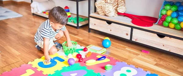 Beautiful Toddler Boy Sitting Puzzle Playing Meals Plastic Plates Fruits — Stock Photo, Image