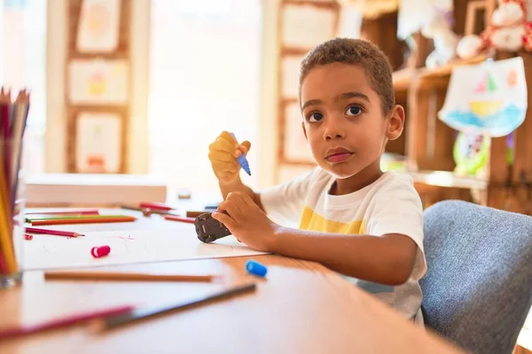 Beautiful African American Toddler Sitting Painting Car Toy Using Marker — ストック写真