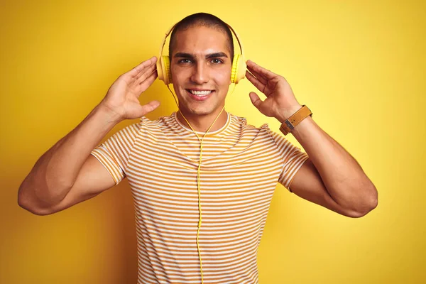 Young Handsome Man Using Headphones Yellow Isolated Background Happy Cool — Stock Photo, Image