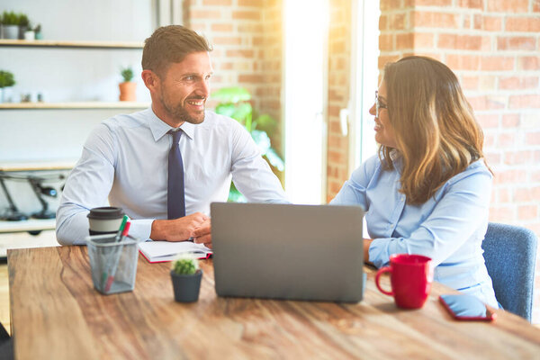 Young business team of woman and man working together at the office