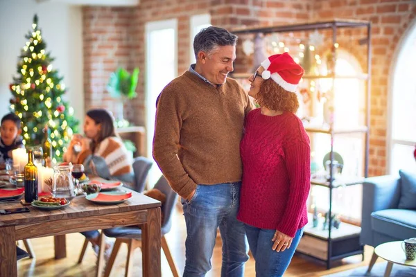 Beautiful Couple Smiling Happy Confident Standing Hugging Celebrating Christmas Family — Stok fotoğraf