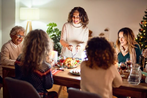 Beautiful Group Women Smiling Happy Confident Carving Roasted Turkey Celebrating — Stock Photo, Image